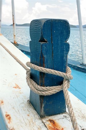 simsearch:400-04433053,k - Marine rope knotted into the blue column Stock Photo - Budget Royalty-Free & Subscription, Code: 400-05701606
