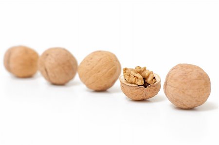 simsearch:400-04833195,k - Open walnut in kine with closed nuts. Concept of unique. Focus on core. Stock Photo - Budget Royalty-Free & Subscription, Code: 400-05703272