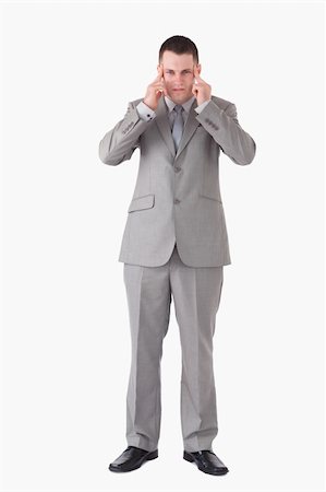 simsearch:400-05697520,k - Portrait of a businessman having a headache against a white background Foto de stock - Super Valor sin royalties y Suscripción, Código: 400-05714882