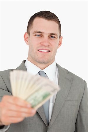 simsearch:400-05715207,k - Portrait of a businessman giving notes against a white background Stock Photo - Budget Royalty-Free & Subscription, Code: 400-05715208