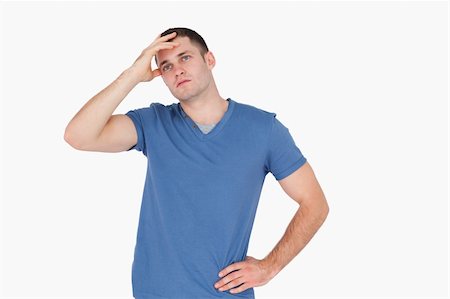 simsearch:400-04918265,k - Depressed young man against a white background Stock Photo - Budget Royalty-Free & Subscription, Code: 400-05715258