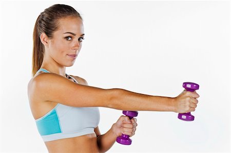 A brunette fitness model preparing to work out Stock Photo - Budget Royalty-Free & Subscription, Code: 400-05716019