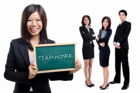 Happy smiling Asian businesswomen holding blackboard with her teammate on white background. Stock Photo - Budget Royalty-Free & Subscription, Code: 400-05716369