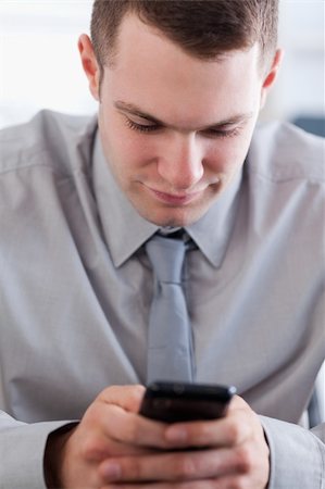 simsearch:400-05710264,k - Close up of concentrated businessman writing a text message Stock Photo - Budget Royalty-Free & Subscription, Code: 400-05710276