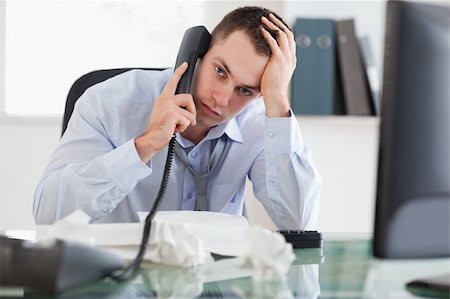 simsearch:400-05710264,k - Close up of depressed and frustrated businessman on the phone Stock Photo - Budget Royalty-Free & Subscription, Code: 400-05710298