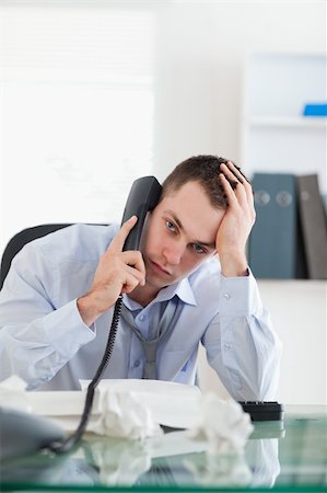 simsearch:400-05710264,k - Close up of frustrated businessman trying to solve a problem on the phone Stock Photo - Budget Royalty-Free & Subscription, Code: 400-05710299