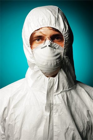 simsearch:400-04340735,k - Scientist in protective wear, glasses and respirator Stock Photo - Budget Royalty-Free & Subscription, Code: 400-05711623
