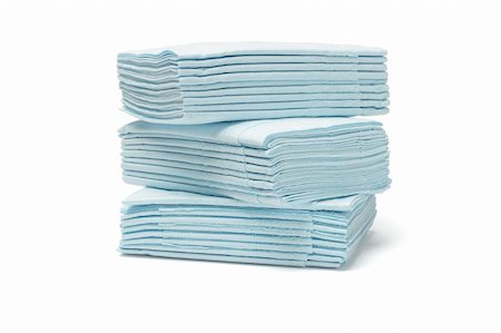 simsearch:400-05370670,k - Stack of blue folded facial tissue papers on white background Stock Photo - Budget Royalty-Free & Subscription, Code: 400-05713572