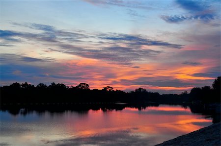 singapore nature scenery - Colourful sky of sunset and its reflection on the water (Punggol Reservoir, Singapore) Stock Photo - Budget Royalty-Free & Subscription, Code: 400-05713586