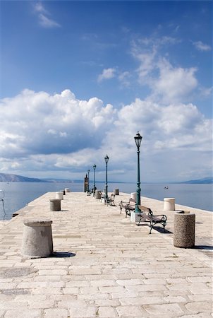 Stone pier in a small Mediterranean town Stock Photo - Budget Royalty-Free & Subscription, Code: 400-05724760