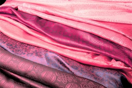 Pink silk fabric from India in a stack. Stock Photo - Budget Royalty-Free & Subscription, Code: 400-05725285