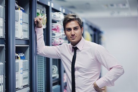 simsearch:400-04239432,k - young handsome business man  engeneer in datacenter server room Stock Photo - Budget Royalty-Free & Subscription, Code: 400-05728727