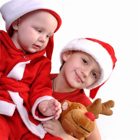 two boy in Santa costumes together Stock Photo - Budget Royalty-Free & Subscription, Code: 400-05721679