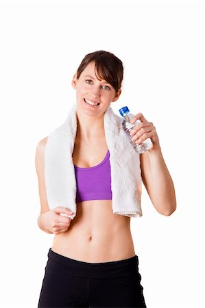 simsearch:400-04180657,k - Athletic woman holding a bottle of water and relaxing after doing exercise, isolated oin white Stock Photo - Budget Royalty-Free & Subscription, Code: 400-05734379
