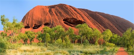 Uluru, Australia - September 2011: Uluru or ayer rock is Australia's most famous natural landmark. It is a huge sandstone rock formation in the southern part of the Northern Territory, central Australia. Stock Photo - Budget Royalty-Free & Subscription, Code: 400-05735810