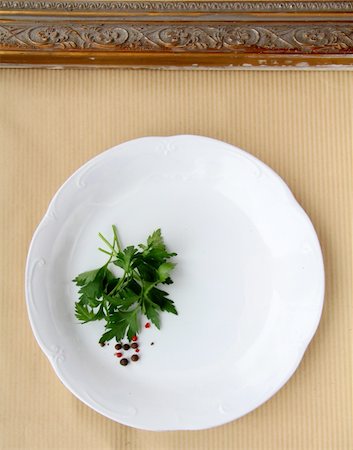 simsearch:400-08786053,k - plates with  sprig of parsley - organic menu Stock Photo - Budget Royalty-Free & Subscription, Code: 400-05735980