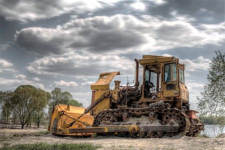 simsearch:400-08791419,k - Old yellow bulldozer on nature background Stock Photo - Budget Royalty-Free & Subscription, Code: 400-05736185