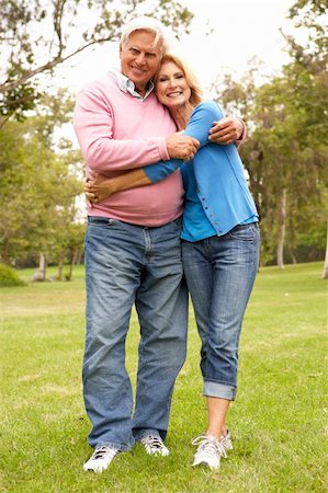 simsearch:400-04035087,k - Senior Couple Walking In Park Stock Photo - Budget Royalty-Free & Subscription, Code: 400-05736241