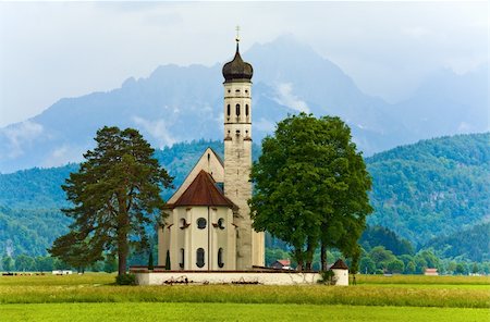 schwangau - Historic medieval Neuschwanstein Castle in Bavaria (Germany) and church near Stock Photo - Budget Royalty-Free & Subscription, Code: 400-05736903