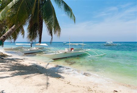 simsearch:400-04418173,k - traditional philippine bangkas on a beach in Alona, Bohol Stock Photo - Budget Royalty-Free & Subscription, Code: 400-05730370