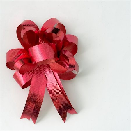 Red ribbon for gift on white background Stock Photo - Budget Royalty-Free & Subscription, Code: 400-05730643