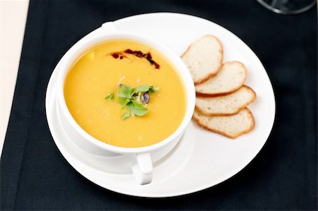 simsearch:400-06079651,k - Puree of squash soup with smoked cheese and croutons Stock Photo - Budget Royalty-Free & Subscription, Code: 400-05731283