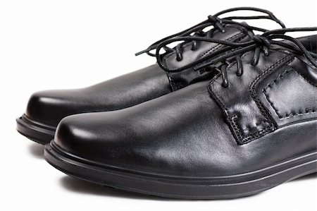 simsearch:700-00157050,k - Macro view of men black shoes with black laces Stock Photo - Budget Royalty-Free & Subscription, Code: 400-05731592