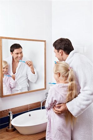 simsearch:400-04151135,k - Father and daughter brushing their teeth in the bathroom Stock Photo - Budget Royalty-Free & Subscription, Code: 400-05732851