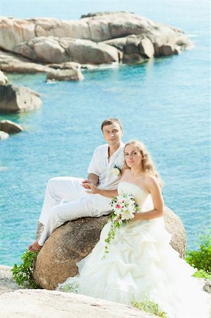 simsearch:400-05328142,k - Bride and groom on the beach. Tropical wedding Stock Photo - Budget Royalty-Free & Subscription, Code: 400-05733444