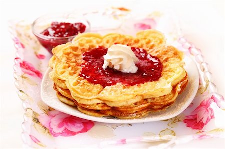 simsearch:400-04370315,k - Waffles with fresh strawberry jam and whipped cream Stock Photo - Budget Royalty-Free & Subscription, Code: 400-05744132