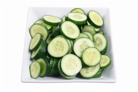 Plate of Lebanese Cucumber on White Background Stock Photo - Budget Royalty-Free & Subscription, Code: 400-05744484