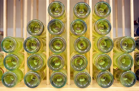 simsearch:400-04226436,k - White wine bottles in wood rack Stock Photo - Budget Royalty-Free & Subscription, Code: 400-05745003