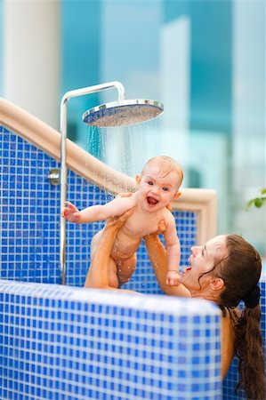 shower kid - Mom playing with baby while taking shower Stock Photo - Budget Royalty-Free & Subscription, Code: 400-05745370