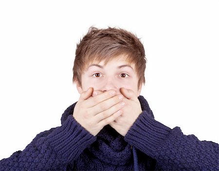 simsearch:400-04175955,k - Teenager in a purple sweater shut his mouth with his hands Stock Photo - Budget Royalty-Free & Subscription, Code: 400-05745463