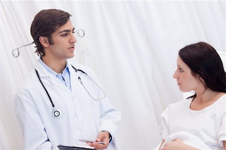 simsearch:400-05748252,k - Female patient getting examination results explained by doctor Stock Photo - Budget Royalty-Free & Subscription, Code: 400-05747188