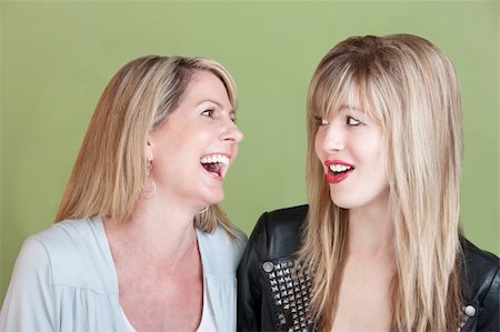 simsearch:400-05918419,k - Caucasian mom with retro-styled daughter laugh together Stock Photo - Budget Royalty-Free & Subscription, Code: 400-05747804