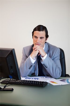 simsearch:400-05748170,k - Businessman waiting for his pc to boot up Stock Photo - Budget Royalty-Free & Subscription, Code: 400-05748155