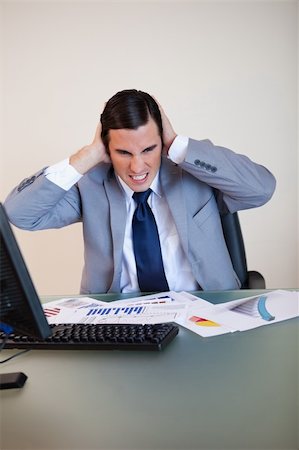simsearch:400-05748170,k - Angry businessman covering his ears Stock Photo - Budget Royalty-Free & Subscription, Code: 400-05748166