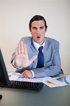 simsearch:400-05748170,k - Businessman trying to calm down his upset negotiation partner Stock Photo - Budget Royalty-Free & Subscription, Code: 400-05748163