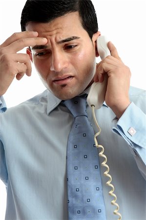 simsearch:400-05388090,k - Stressed, depressed, worried or upset business man using telephone.  Useful for many situations.  White background. Stock Photo - Budget Royalty-Free & Subscription, Code: 400-05748648