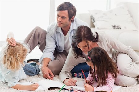 pencil painting pictures images kids - Family drawing together in a living room Stock Photo - Budget Royalty-Free & Subscription, Code: 400-05749702