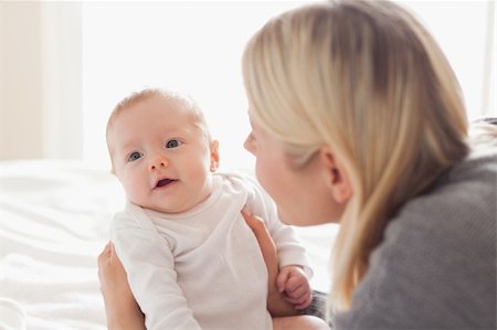 premature - Young mother holding newborn Stock Photo - Budget Royalty-Free & Subscription, Code: 400-05741261