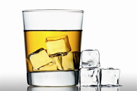 simsearch:400-04558755,k - glass of whisky on the rocks with ice cubes next to, isolated on white Stock Photo - Budget Royalty-Free & Subscription, Code: 400-05742475