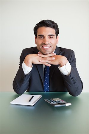 simsearch:400-05748170,k - Portrait of an accountant posing in his office Stock Photo - Budget Royalty-Free & Subscription, Code: 400-05742742