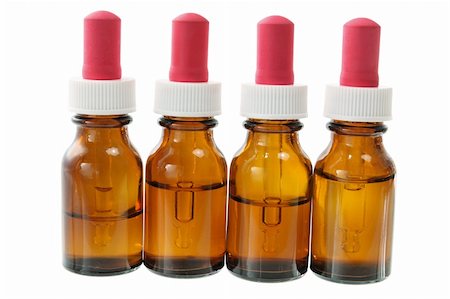 Bottles of Massage Oil on White Background Stock Photo - Budget Royalty-Free & Subscription, Code: 400-05752857