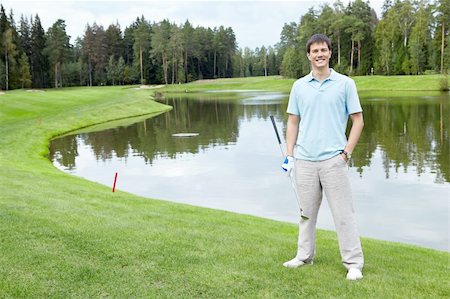 simsearch:400-05753044,k - A young man on the golf course Stock Photo - Budget Royalty-Free & Subscription, Code: 400-05753045