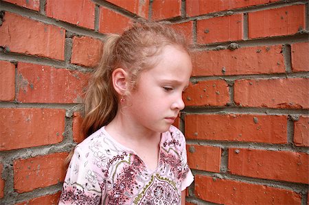 simsearch:695-05780518,k - sad child with a brick wall Stock Photo - Budget Royalty-Free & Subscription, Code: 400-05875485