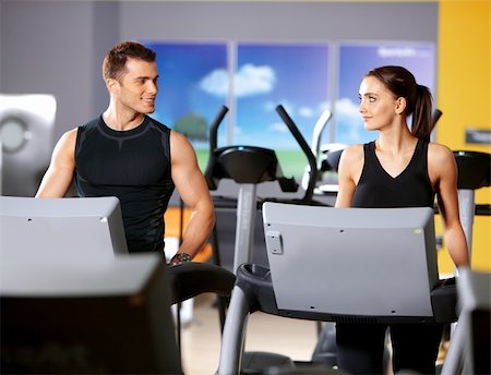 Sporty couple exercising at the fitness gym Stock Photo - Budget Royalty-Free & Subscription, Code: 400-05875704