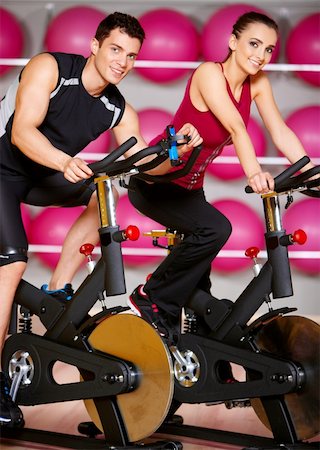 Sporty couple exercising at the fitness gym Stock Photo - Budget Royalty-Free & Subscription, Code: 400-05875713