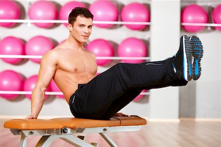 simsearch:400-05268701,k - Handsome man at the gym doing exercises Foto de stock - Super Valor sin royalties y Suscripción, Código: 400-05875754